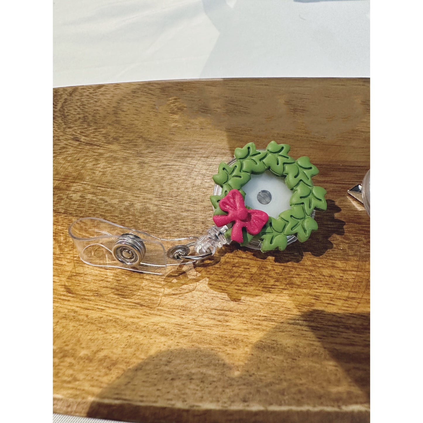 Christmas wreath badge reel